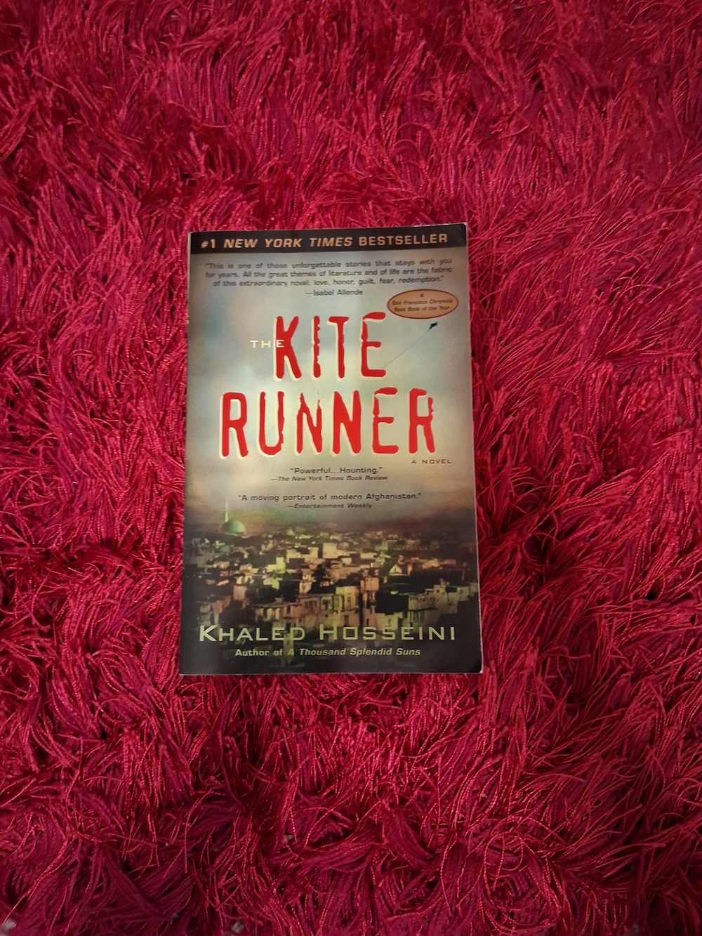 The Kite Runner book by Khaled Hosseini.